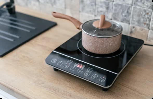 Induction Stoves Induction Stoves image